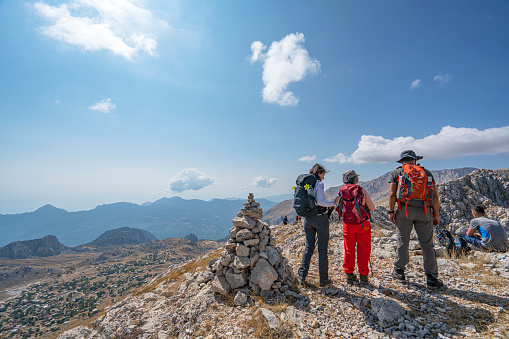 Alabelen Mountain, Antalya, Turkey-September 3, 2023: people hiking with the scenic view of Feslikan Plateau and Alaben Mountain, Antalya, Turkey