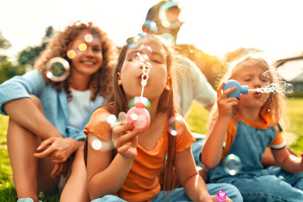 Happy family relaxing in the park