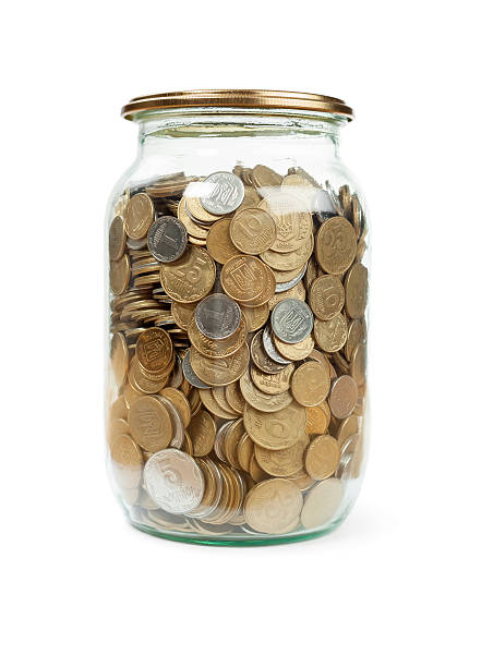 istock Coins in the jar on white background 166286085