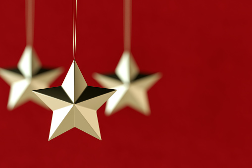 Christmas background with star shape, new year concept on red background. Digitally generated image.