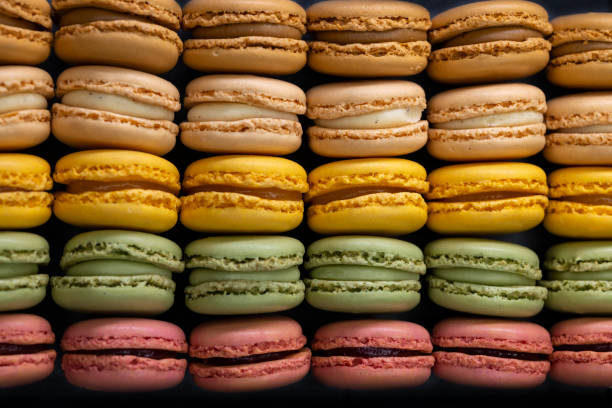istock macaroons of different colors on a black background 1662881309