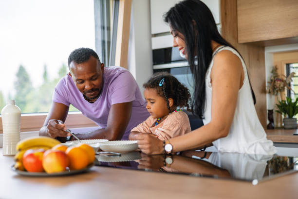istock Diverse Supportive Parents Talking To Their Daughter At Breakfast In A Modern Kitchen 1662883918