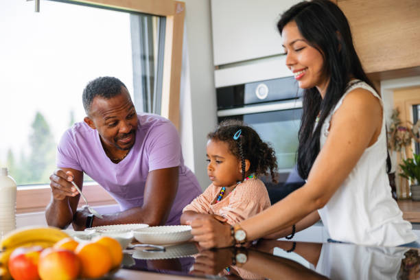 istock Diverse Supportive Parents Talking To Their Daughter At Breakfast In A Modern Kitchen 1662883934
