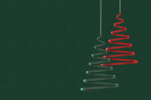 Christmas background with tree, new year concept on green color background. Digitally generated image.