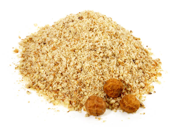 istock Ground Earth Almonds - Organic Tigernuts on white Background Isolated 1662908636