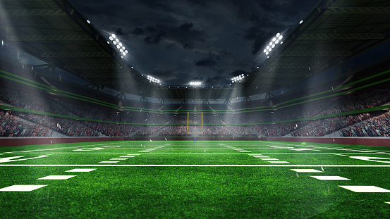 American football arena with yellow goal post, grass field and blurred fans at playground view. 3D render. Flashlights