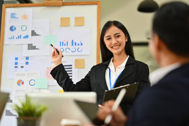 istock Businesspeople having fun cooperating working together on a new project in an office 1662910893