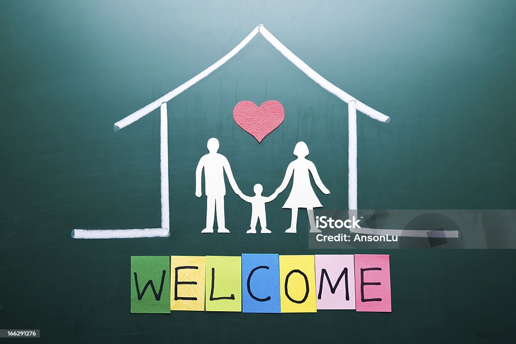 Приветствуем word и семьи в дом - Стоковые фото Ипотека роялти-фри
