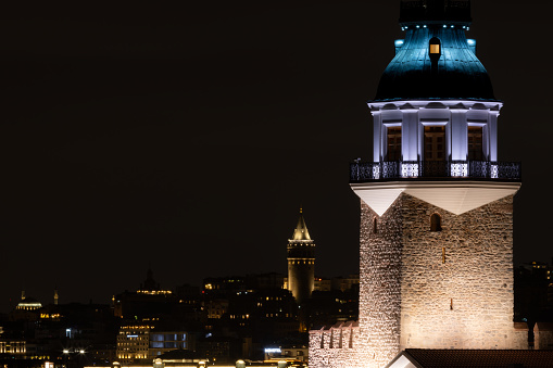 Istanbul cityscape with Maiden's Tower at night.