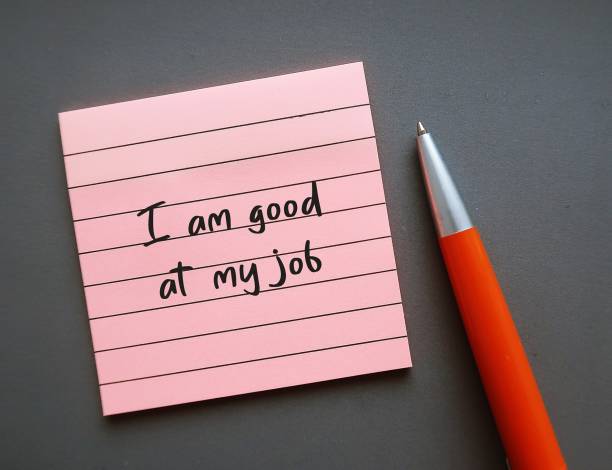 istock Office note pad on gray copy space background with handwriting - I am good at my job - positive self talk affirmation for self motivation at work 1662929726