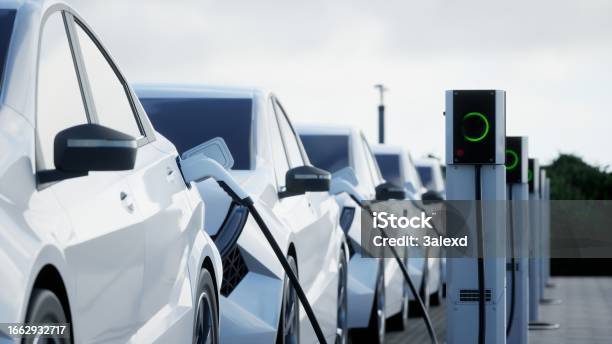 Electric Car Charging Stock Photo - Download Image Now - Electric Car, Electric Vehicle Charging Station, Electric Vehicle