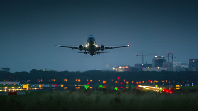 Passenger airplane taking of at dusk