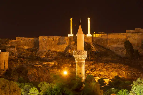 Night view of rizvaniye mosque in the front and Sanlurfa castle in the back