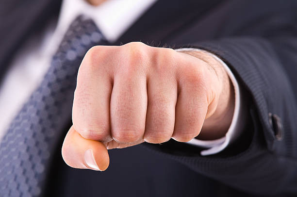 istock Businessman showing punch. 166295676