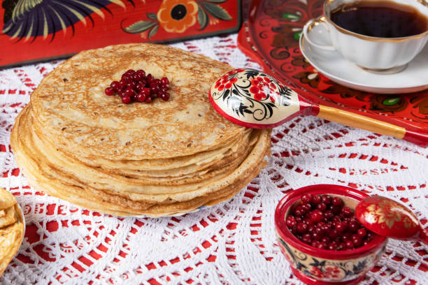 istock Russian pancake blini with berries and sour cream 1662960944