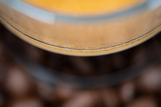 Abstract view of a glass cup of coffee.