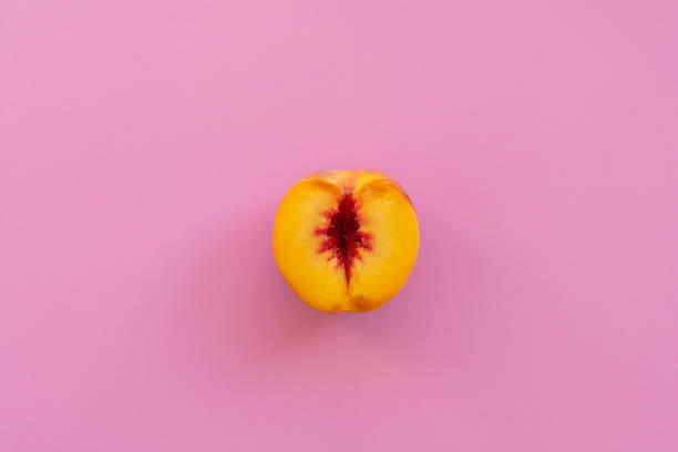 Peach on a pink background.