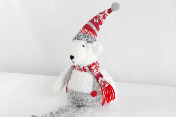 istock Polar bear stuffed animal with Christmas hat and scarf 1663008872