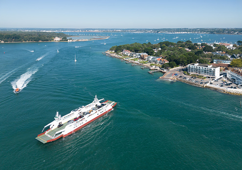 Fremantle,WA,Australia-November 13,2016: Boat, Livestock Carrier and commercial port with large cranes along the Swan River in Fremantle, Western Australia.