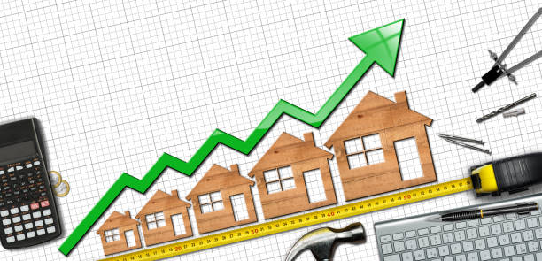 istock Growth Graph with Wooden Houses and Green Arrow Moving Up 1663012427