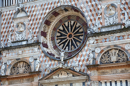 Rose window of the Cappella Colleoni (was built with marble elements between 1472 and 1476) of the Basilica di Santa Maria Maggiore. It major town church and was founded in 1137. Bergamo, Italy.