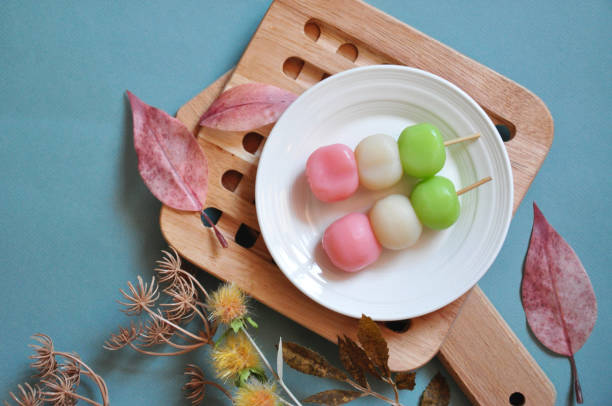istock Top view of Japanese Dessert Dango on Blue Background 1663041652