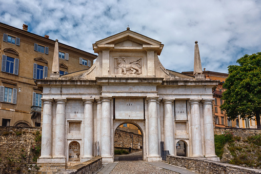 View of the Porta San Giacomo gate in Bergamo. Its gate, leading through the Venetian walls to the upper city of Bergamo, was built in 1592 from pinkish-white marble.