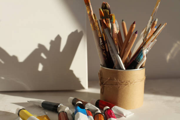 istock Empty copy space canwas and paintbrush, acrylic color in artistic workshop interior. 1663047158