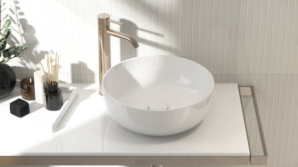 istock White stone vanity counter, modern bowl washbasin, chrome faucet, aromatherapy diffuser in sunlight, shadow on cream wood wainscot wall 1663074890