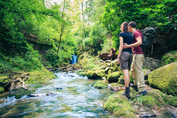 istock young couple hiking 166309392
