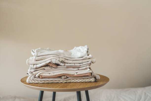 istock Stack of children's things on a wooden pedestal 1663103774