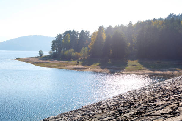 istock Batak Reservoir dam in autumn, Bulgaria 1663108056