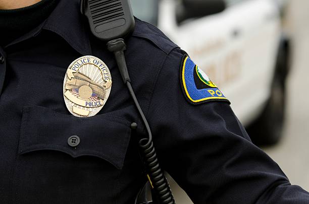 istock A police officer in uniform with a badge 166311199
