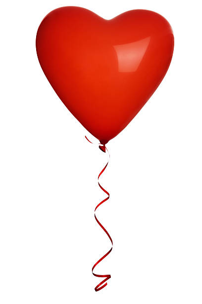 istock A red love heart shaped balloon against a white background 166311446