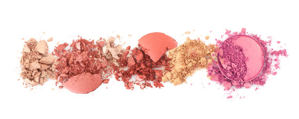 istock Crumble and crushe pearl beige bronze circle eyeshadows, powder. Broken cosmetics on white background. 1663117782