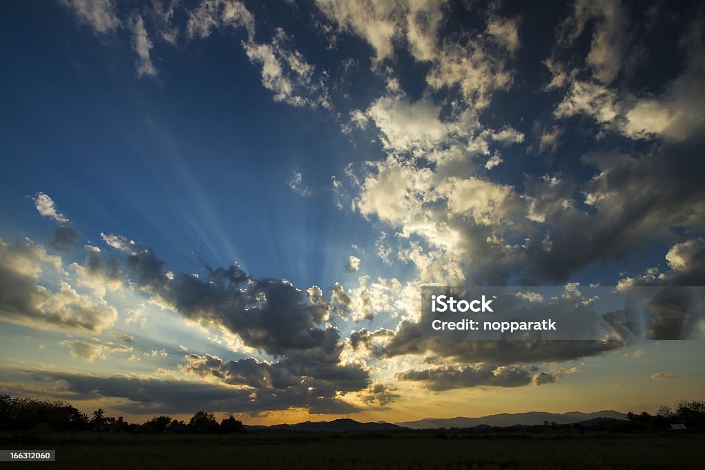 Cloud Scape Amazing sunset with sun raysamazing cloud and blue sky Atmospheric Mood Stock Photo