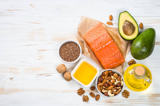 istock Healthy fats products at black background. 1663140738