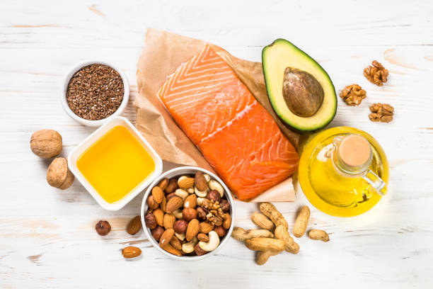 istock Healthy fats products at black background. 1663140936