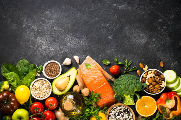 istock Healthy vegan food at black background top view. 1663141575