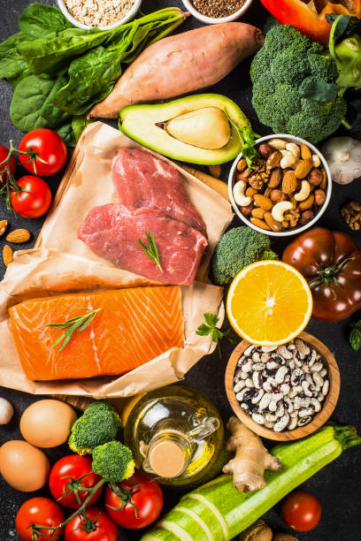 istock Healthy food products at black background top view. 1663141602