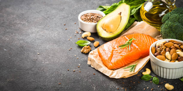 istock Healthy fats products at black background. 1663142149