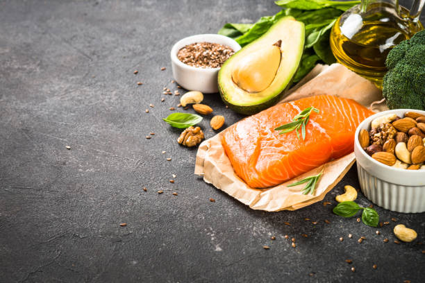 istock Healthy fats products at black background. 1663142159