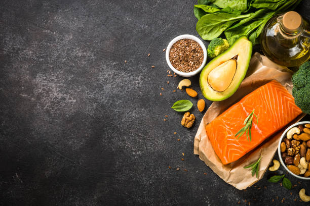 istock Healthy fats products at black background. 1663142171