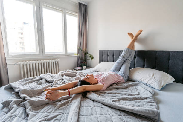 istock Young Woman Lying In The Bed In The Morning 1663162201