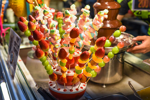 marshmallow and strawberry with grape on sticks for fondue