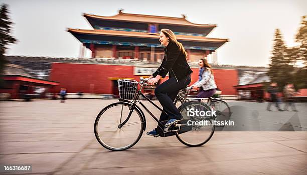 Tourists In Beijing Riding Bikes Stock Photo - Download Image Now - China - East Asia, Beijing, Travel