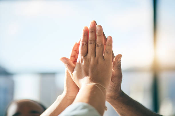 istock High five, hands together and business people, success and collaboration with support, target goals and closeup. Meeting, team building and achievement, achievement and agreement, synergy and mission 1663171666