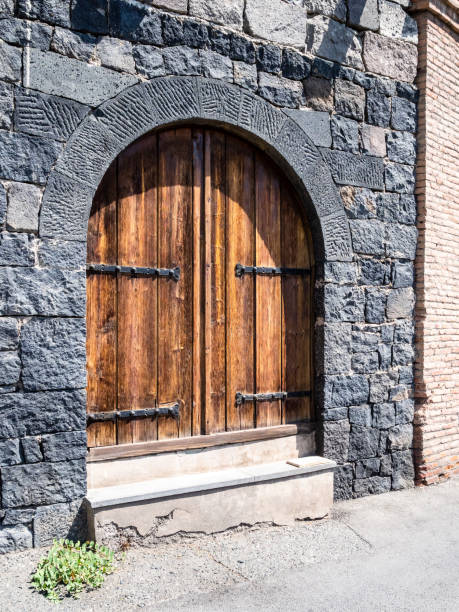 istock old wooden door in stone urban house in Yerevan 1663182103