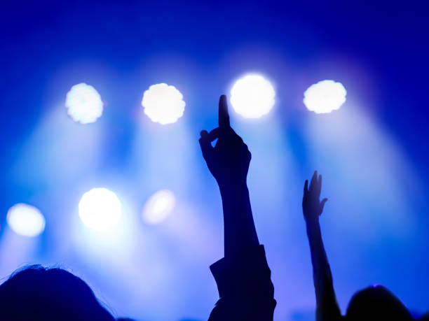 istock Hands up. Nightlife and disco concept. People dancing in club party. Selective Focus 1663203629