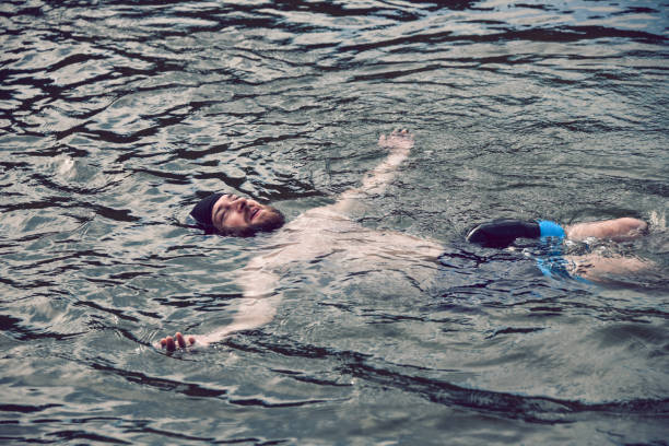 istock Smiling Male Relaxing And Floating On River Water 1663222554